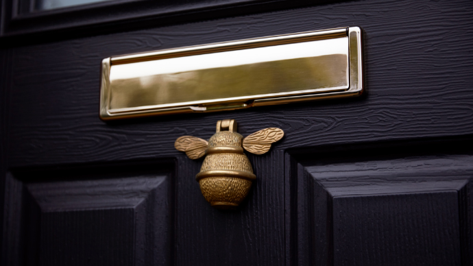 Composite door hardware