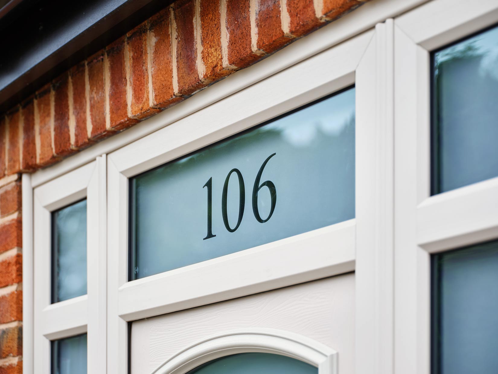 Composite front door glazing